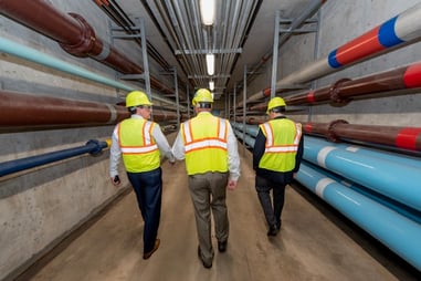U.S. EPA David Ross walking through NEW Water tunnel system