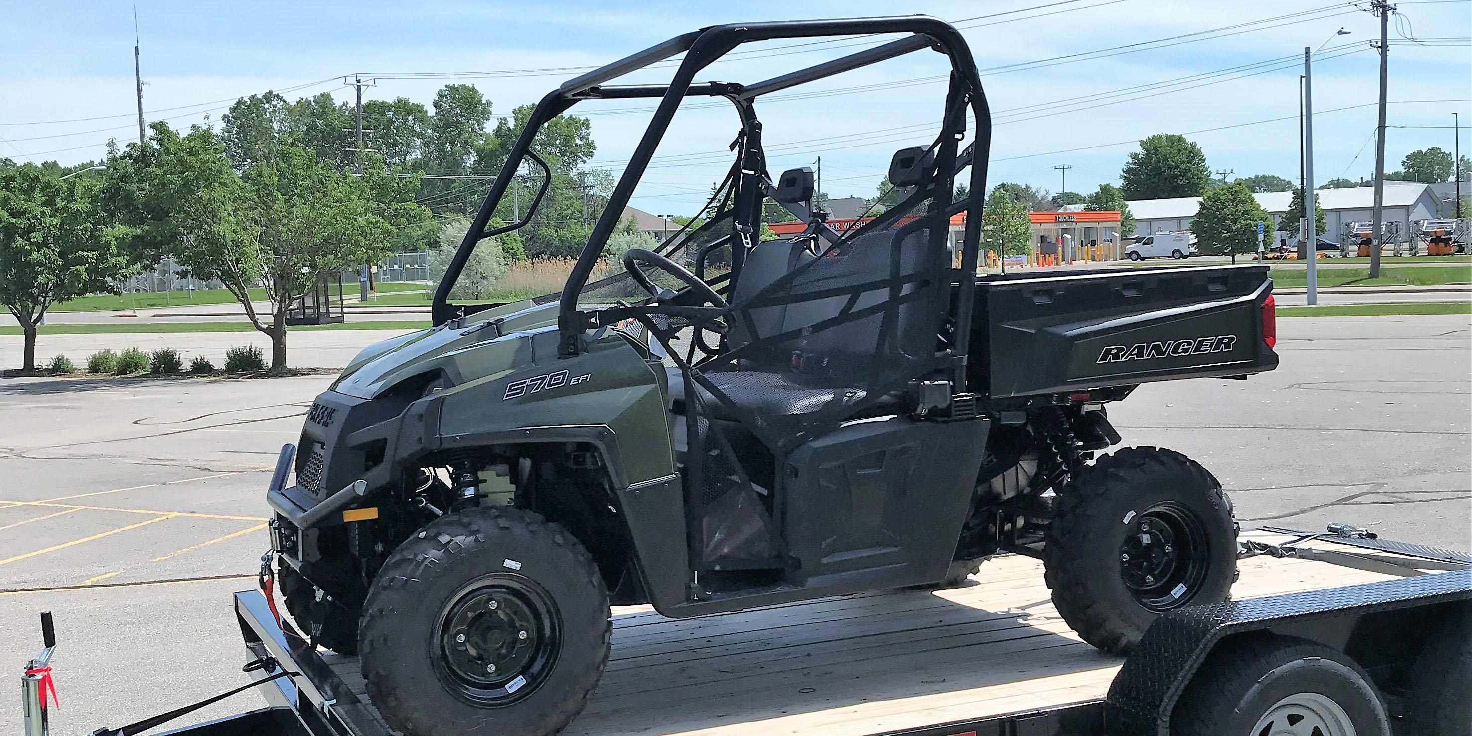 Side-by-side UTV and trailer for NEW Water