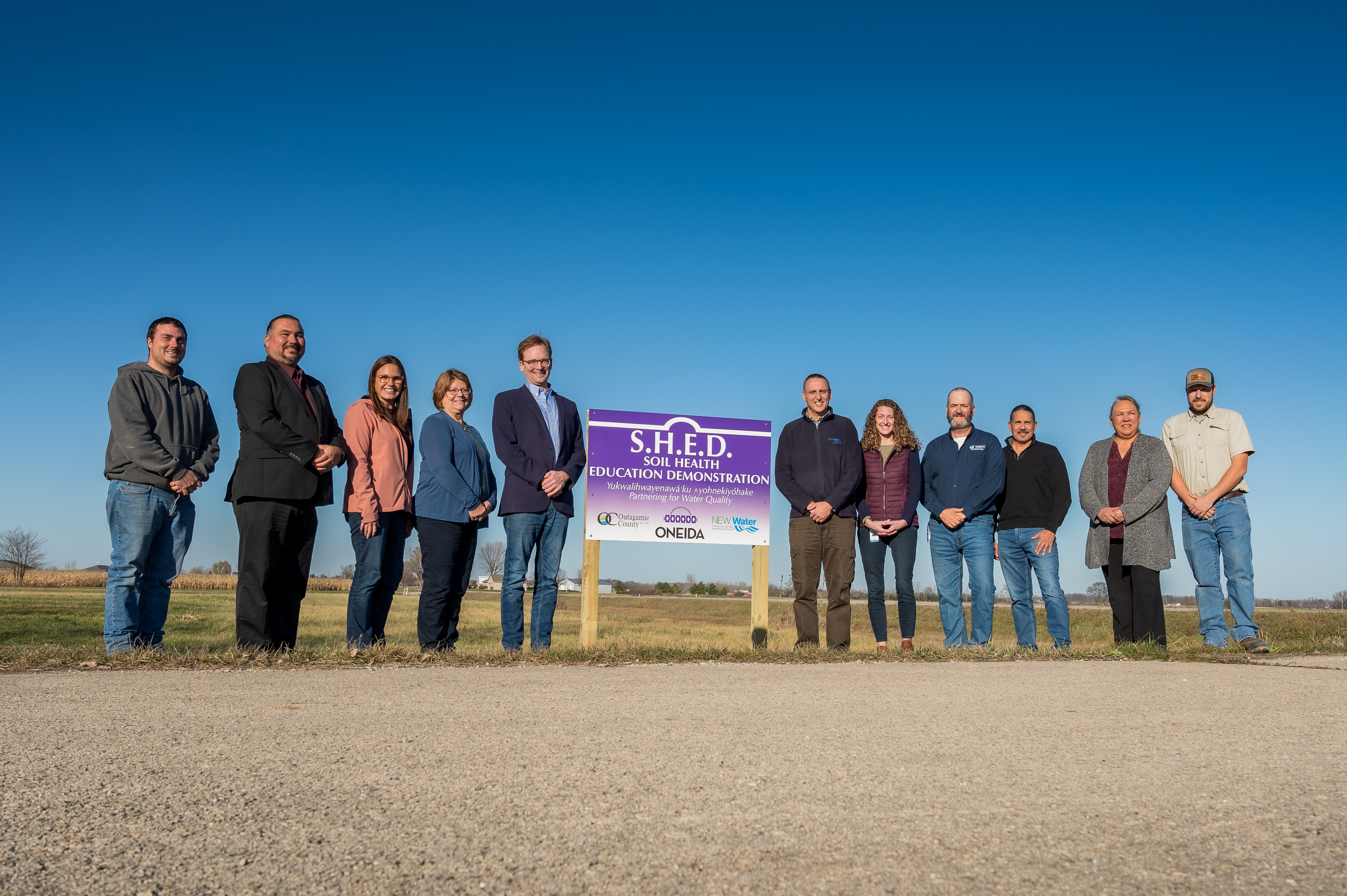 Ribbon Cutting for the Soil Health Education and Demonstration (SHED) facility featuring Oneida Nation, Outagamie County, Fox Wolf Watershed Alliance, and NEW Water. 