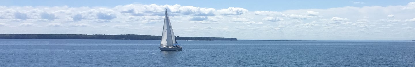 A sail boat on the water